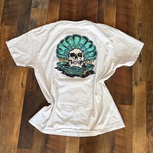 Dark Seas Graphic Tshirt PEARL STOCK TEE with Skull and Shell Design